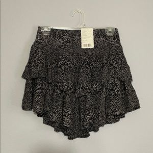 Black with white polka dot skirt